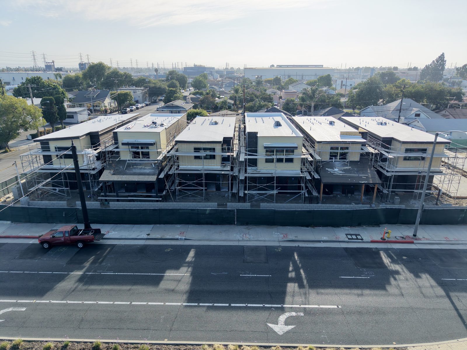 Entrada homes under construction viewed from Paramount Boulevard, June 2026