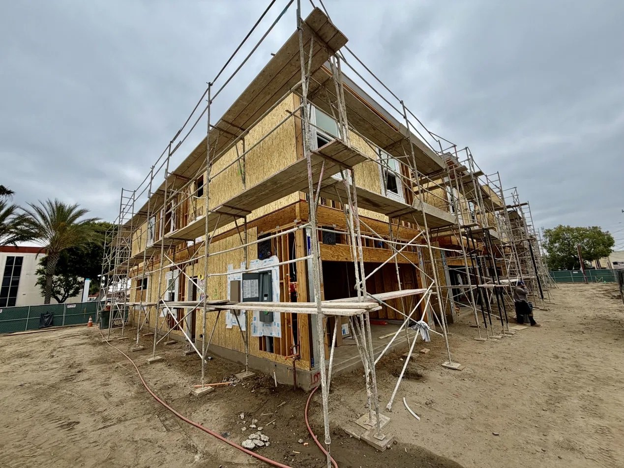 Entrada construction progress, west elevation, May 2026