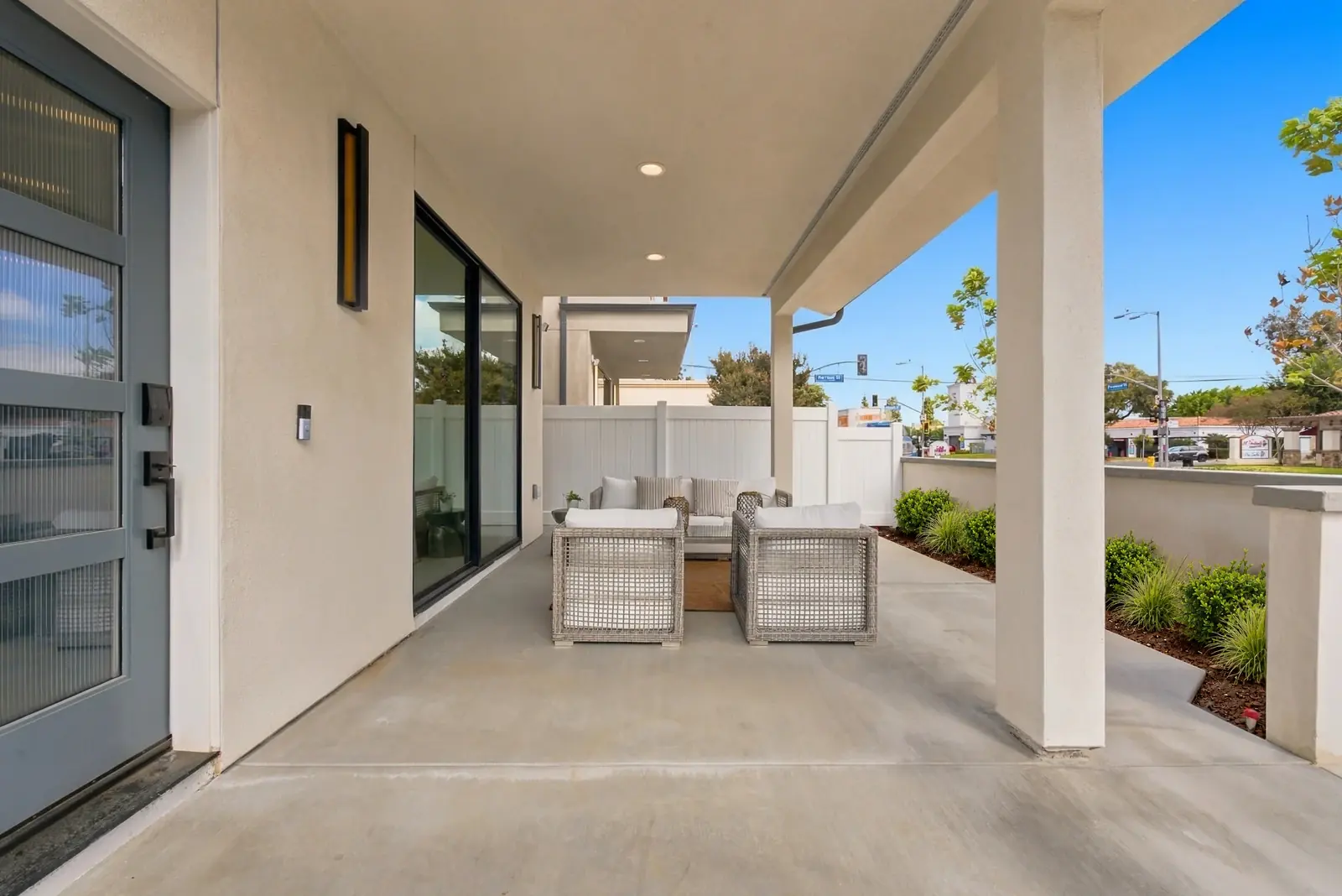 A private fenced front patio at The Meridian